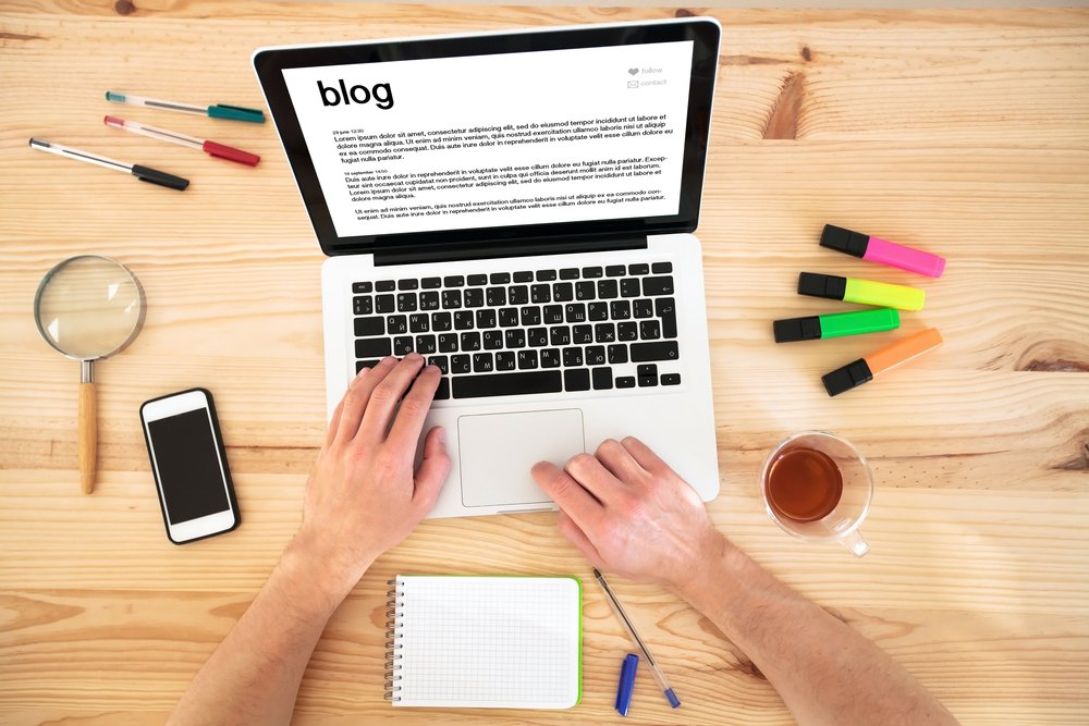 Blog,,Top,View,Of,Hands,And,Keyboard