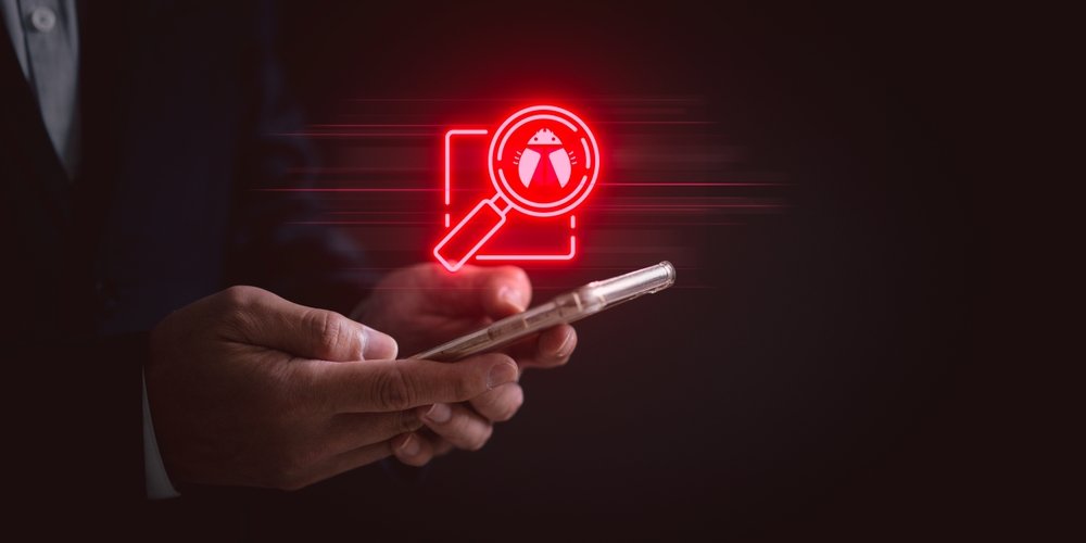 Cybersecurity,Threat,Analysis,Concept.,Businessman,Using,Smartphone,With,A,Virtual